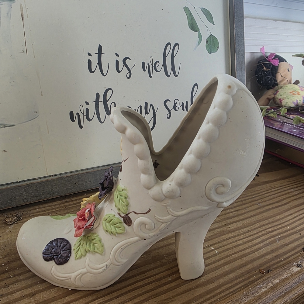 Artistic Cream Ceramic Shoe with Floral Accents